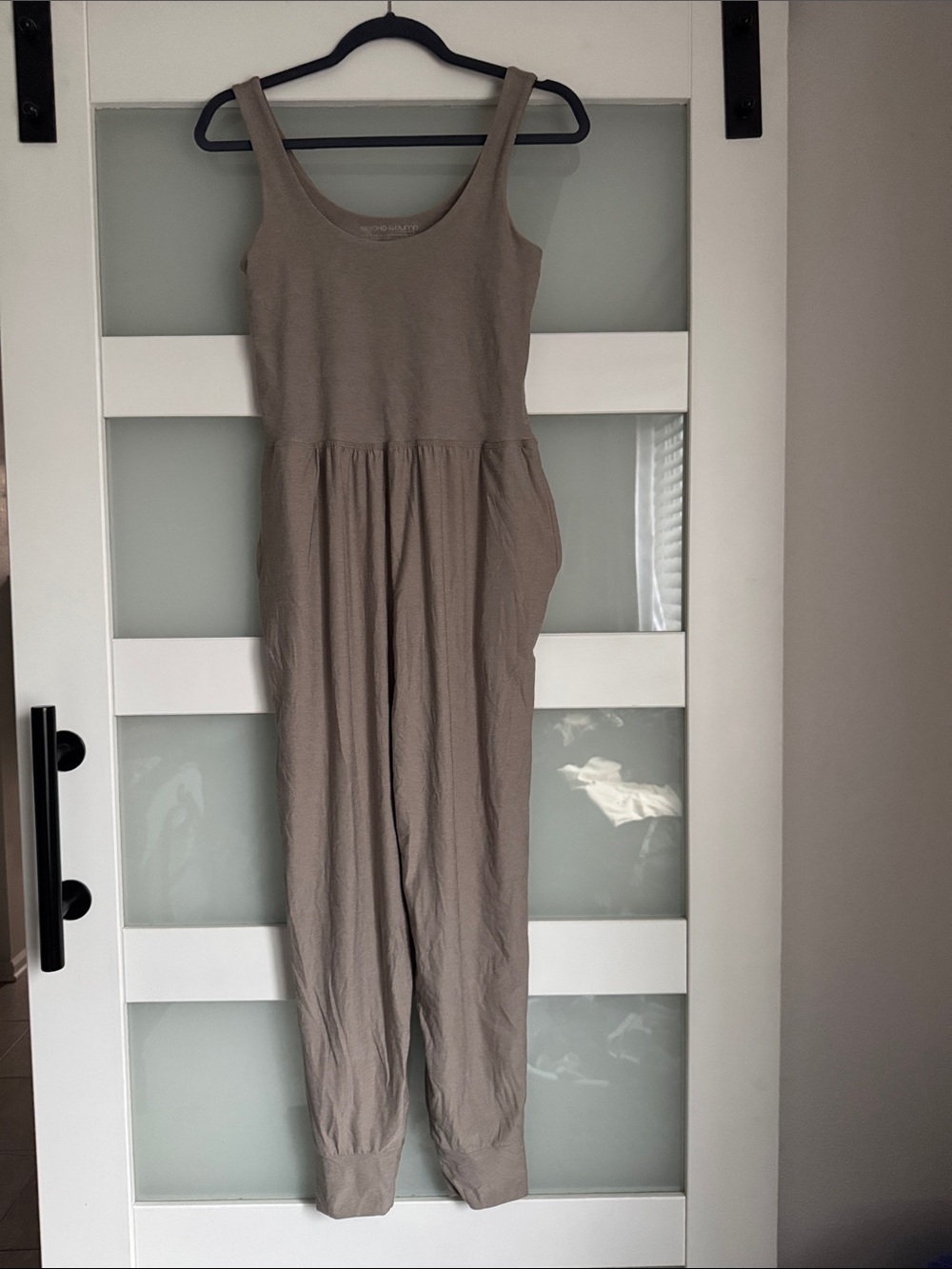 Beyond Yoga Beyond the Bump Sleeveless Scoop Neck Jumpsuit in Taupe